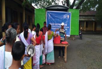 People wait patiently to be served